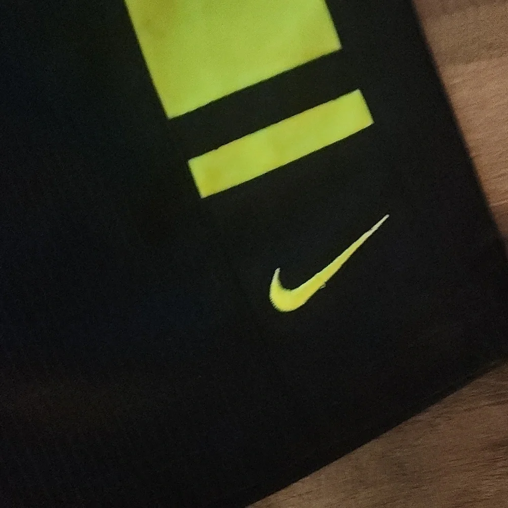 NIKE Atheletic Shorts Size Medium  Black and Yellow